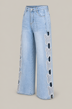 Load image into Gallery viewer, light-wash-distressed-ripped-wide-leg-jeans — stone gray product three-quarter front image