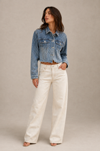 Load image into Gallery viewer, light-wash-eyelet-denim-jacket-detail-product — stone gray editorial model front image