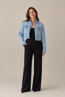 Load image into Gallery viewer, light-wash-eyelet-denim-jacket — stone gray editorial model front image