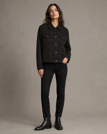 Load image into Gallery viewer, Model styling the longer black rhinestone trucker jacket, front view