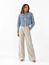 Load image into Gallery viewer, embellished light wash denim jacket pair 01 - editorial-model-front
