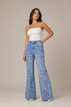 Load image into Gallery viewer, catalog-nr4010-light-wash-denim-pants-reference — stone gray editorial model three-quarter image