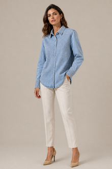 Load image into Gallery viewer, light-wash-denim-button-down-shirt — stone gray editorial model three-quarter image