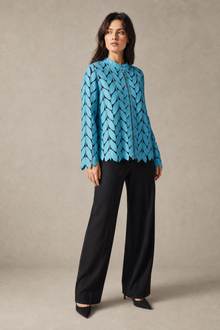 Load image into Gallery viewer, light-blue-laser-cut-jacket — stone gray editorial model three-quarter image