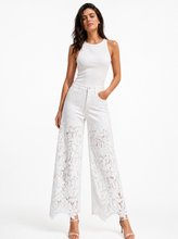 Load image into Gallery viewer, white lace applique wide leg jeans - editorial-model-three-quarter