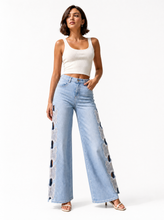 Load image into Gallery viewer, light wash distressed ripped wide leg jeans - editorial-model-three-quarter