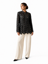 Load image into Gallery viewer, black laser cut jacket - editorial-model-three-quarter