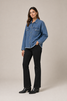 Load image into Gallery viewer, medium-blue-studded-denim-jacket — slot 07 normalized age-25 boots editorial model three-quarter v5
