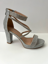 Load image into Gallery viewer, Strappy platform sandal heel with crystal embellishments. Comes in gold, silver, and black. Good for parties and formal occasions. Criss-cross front pattern. Wedge high heel for more support. Silver color. White crystals.