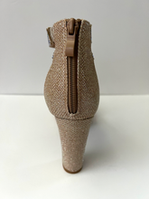 Load image into Gallery viewer, Strappy platform sandal heel with crystal embellishments. Comes in gold, silver, and black. Good for parties and formal occasions. Criss-cross front pattern. Wedge high heel for more support. Gold color. White crystals.
