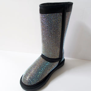 Black winter boots covered in crystal embellishments. Hit the mid-to-upper calf. Entire boot embellished with iridescent silver crystals.  Fuzzy lining on the insides, including the sole to add warmth.  Textured outsole for traction.