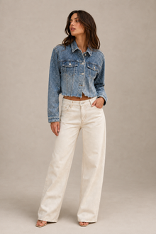 Load image into Gallery viewer, light-wash-eyelet-denim-jacket-detail-product — stone gray editorial model front image
