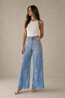 Load image into Gallery viewer, light-blue-denim-lace-overlay-wide-leg-pants — stone gray editorial model front image
