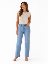 Load image into Gallery viewer, light blue wide leg embroidered denim pants - editorial-model-front
