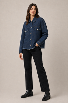 Load image into Gallery viewer, dark-indigo-studded-denim-jacket — slot 07 native longer-body no-false-pocket-lines editorial model three-quarter v8
