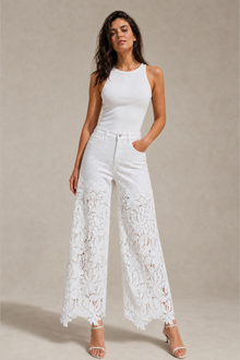 Load image into Gallery viewer, white-lace-applique-wide-leg-jeans — stone gray editorial model three-quarter image
