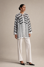Load image into Gallery viewer, black-white-leaf-pattern-jacket — stone gray editorial model three-quarter image
