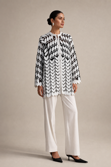 Load image into Gallery viewer, black-white-leaf-pattern-jacket — stone gray editorial model three-quarter image
