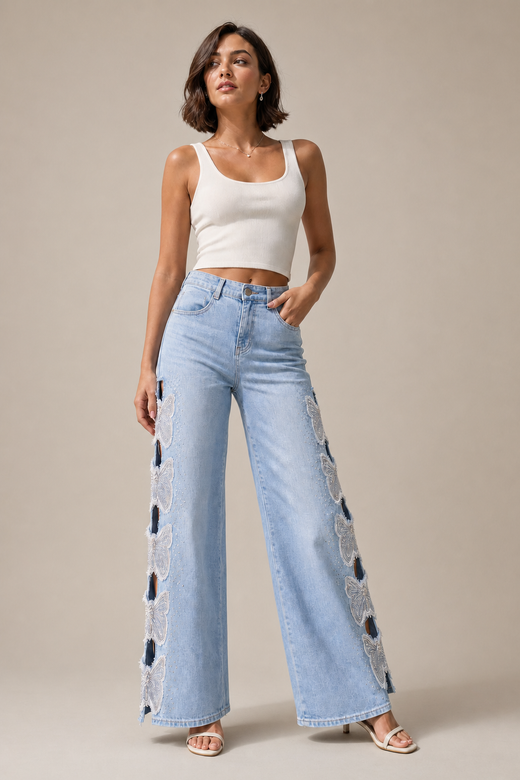 light-wash-distressed-ripped-wide-leg-jeans — stone gray editorial model three-quarter image
