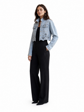 Load image into Gallery viewer, light wash eyelet denim jacket - editorial-model-three-quarter
