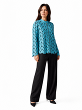 Load image into Gallery viewer, light blue laser cut jacket - editorial-model-three-quarter

