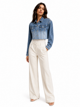 Load image into Gallery viewer, light wash eyelet denim jacket detail product - editorial-model-three-quarter
