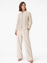 Load image into Gallery viewer, cream laser cut jacket 01 - editorial-model-three-quarter
