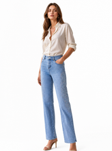 Load image into Gallery viewer, light blue wide leg embroidered denim pants - editorial-model-three-quarter

