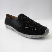 Load image into Gallery viewer, Black slip-on sneakers with black chunky crystals and a gray sole.
