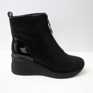 Black crystal wedge boots with a zip-up upper.