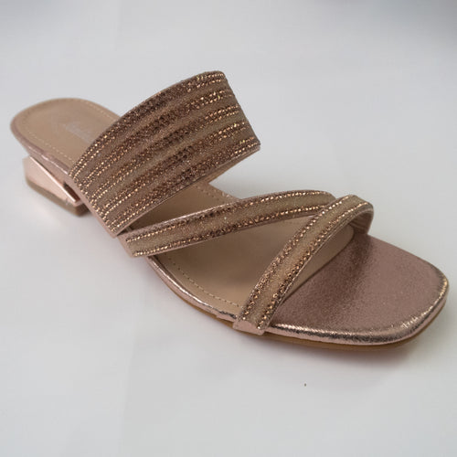 Rose gold strappy sandals with a metallic block heel.  Crystal embellished straps. Reflective metallic block heel.
