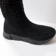 Load image into Gallery viewer, Black knee-high sock sneaker boot hybrid with crystal embellishments. Stretchy sock-knit upper embellished with black crystals. Pull-on style. Black sneaker-like soles.
