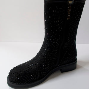 Black boots with a side-zipper.   Inner side-zipper. Cut at the mid-calf. Round-toe. Suede-like upper with black crystal embellishments.