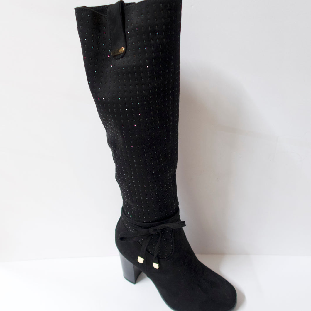 Crystal-embellished black knee-high boots with a side-bow on the ankle. Inner side zipper. Suede-like upper with black crystal embellishments. Block heel.