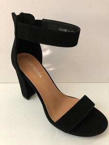 Black strappy party shoes. Strappy high heels. Open toe sandal high heels in black with large straps. Chunky heel. Secure fit with zipper closed heel backing. Good for parties and fancy events. Party shoes