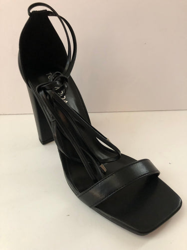 Open toe sandal high heels with leather lace ties in sleek black. Chunky heel. Secure fit with leather shoelaces. Open toe sandal heel. Square front. Good for parties and fancy events