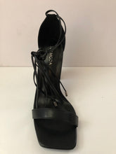 Load image into Gallery viewer, Open toe sandal high heels with leather lace ties in sleek black. Chunky heel. Secure fit with leather shoelaces. Open toe sandal heel. Square front. Good for parties and fancy events
