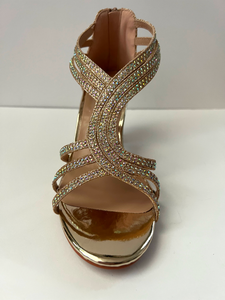 Crystal embellished kitten heel open-toed sandals with interlacing patterns  Good for parties and formal occasions. Comes in silver, gold, and black. Zipper at back of shoe for extra security with straps at ankle and foot. Low kitten heel for additional comfort. Gold color. White crystals.