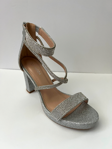 Strappy platform sandal heel with crystal embellishments.  Comes in gold, silver, and black. Good for parties and formal occasions. Criss-cross front pattern. Wedge high heel for more support. Silver color. White crystals.