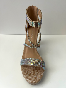 Strappy platform sandal heel with crystal embellishments.  Comes in gold, silver, and black. Good for parties and formal occasions. Criss-cross front pattern. Wedge high heel for more support. Gold color. White crystals.