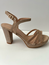 Load image into Gallery viewer, Glitter and crystal embellished platform sandal heels. Good for parties and formal occasions. Platform for additional support. Ankle strap to keep foot in place. Three decorative straps at front of shoe for decoration. Comes in gold, silver, and black. Gold color.

