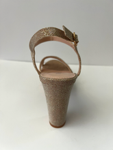 Load image into Gallery viewer, Glitter and crystal embellished platform sandal heels. Good for parties and formal occasions. Platform for additional support. Ankle strap to keep foot in place. Three decorative straps at front of shoe for decoration. Comes in gold, silver, and black. Gold color.
