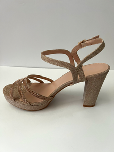 Glitter and crystal embellished platform sandal heels. Good for parties and formal occasions. Platform for additional support. Ankle strap to keep foot in place. Three decorative straps at front of shoe for decoration. Comes in gold, silver, and black. Gold color.