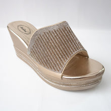 Load image into Gallery viewer, Gold slip-on wedges with crystals embellishing the upper strap.
