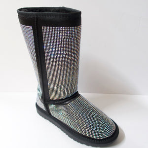Black winter boots covered in crystal embellishments. Hit the mid-to-upper calf. Entire boot embellished with iridescent silver crystals.  Fuzzy lining on the insides, including the sole to add warmth.  Textured outsole for traction.