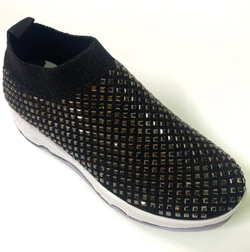 Super comfortable and easy to slip-on black crystal-embellished slip-on sneakers.  Entire upper embellished with crystals. Slip-on style. Textile upper with plenty of stretch for added comfort. Padded insole for comfort.